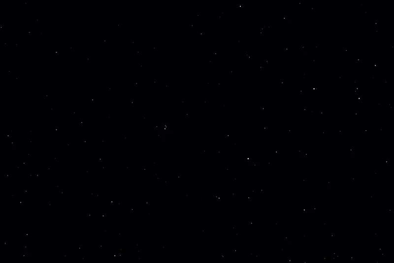Starfield screensaver: hundreds of small white stars scattered over black, streaming toward the viewer